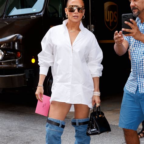 jennifer lopez versace denim boots|Jennifer Lopez Celebrates Her Latest Award by Wearing Denim .